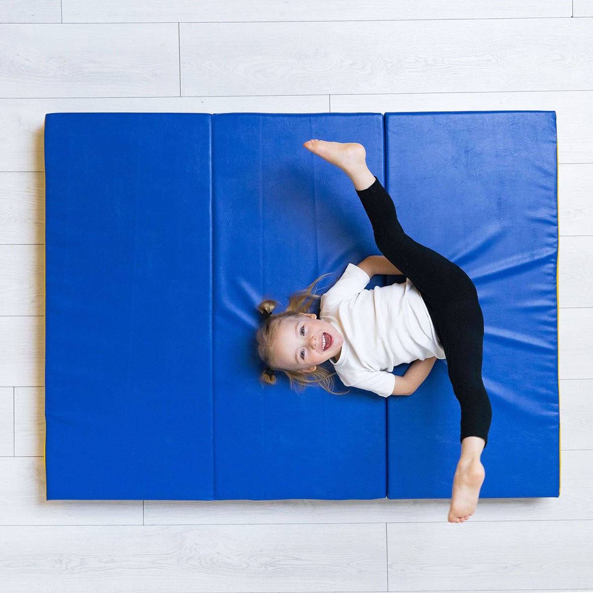 blue yellow folding safety mat for indoor play gym romana onesports