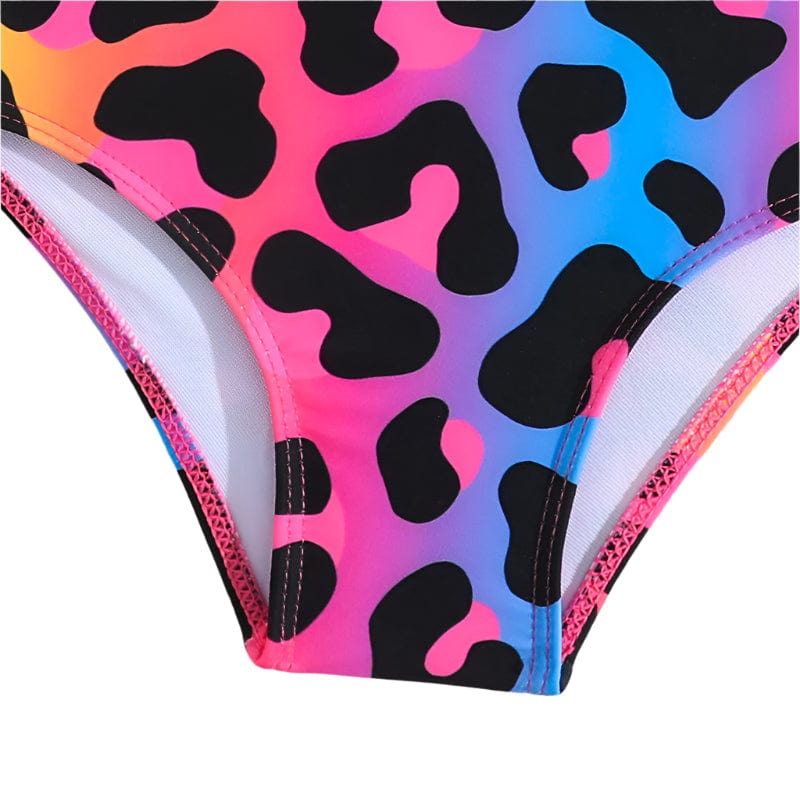 Multicolored girl swimsuit with black abstract pattern o