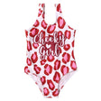 One-piece swimsuit with red and pink leopard print and 'Cheeky Girl' text 